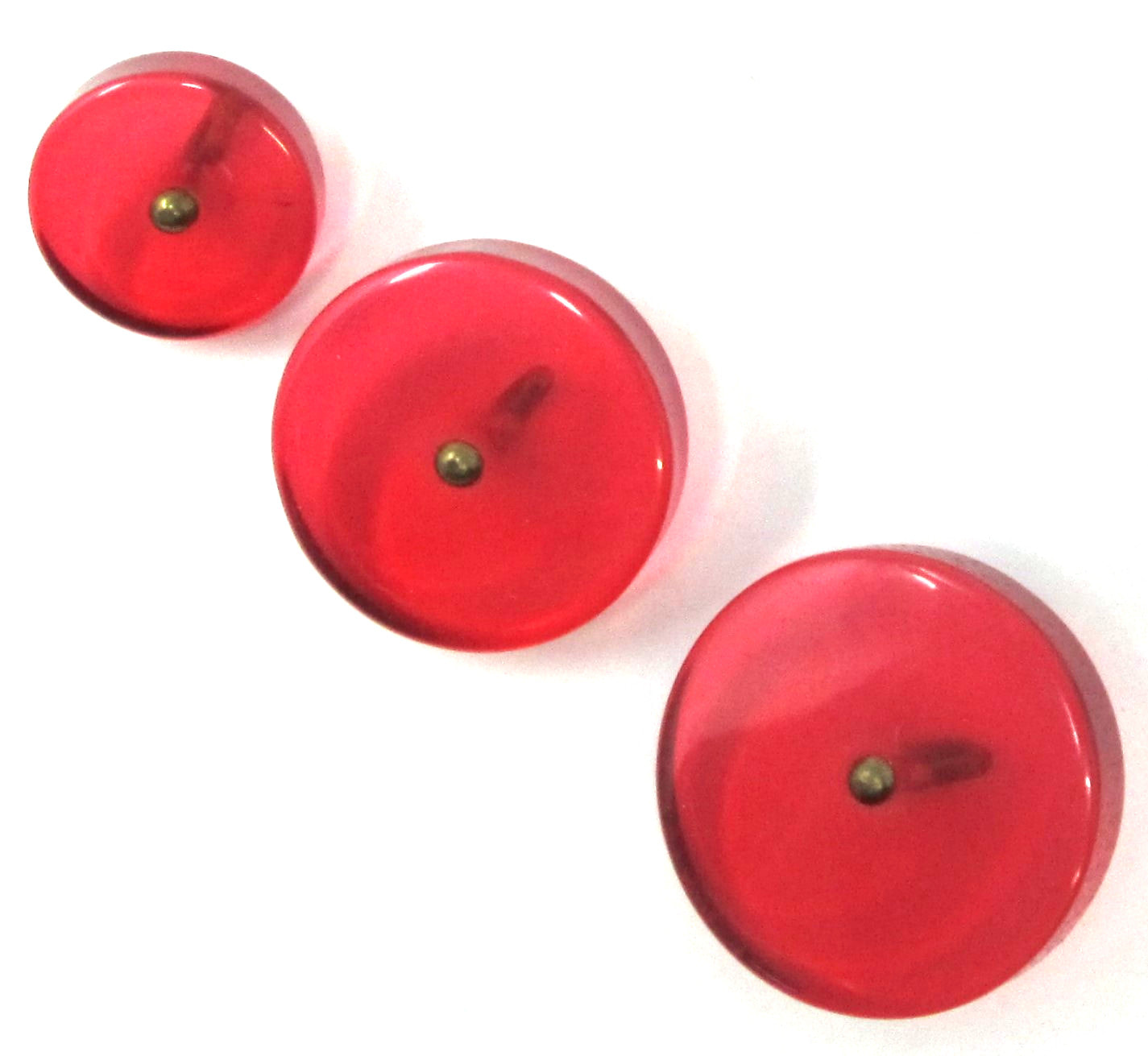 Red clear buttons with pin shank in antique goldtone